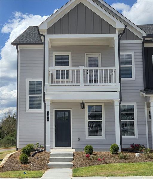 Front exterior of a new home in Apalachee Overlook, Winder, GA, highlighting curb appeal (Image 1). Front exterior of a new home in Apalachee Overlook, Winder, GA, highlighting curb appeal (Image 1).
