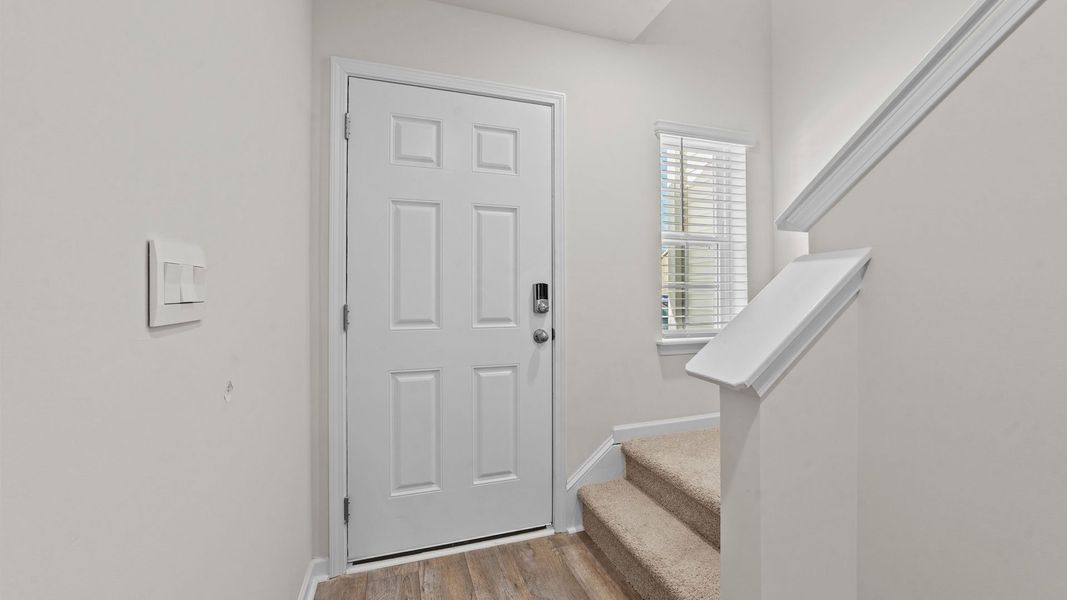 Representative furnished interior of a home built from the Pearson by D.R. Horton in The Townes at Carter Ridge, Greenville (Image 7).