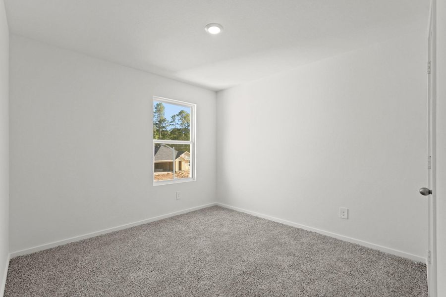 Spacious, unfurnished interior of a new home in New Waverly Station, New Waverly (Image 20).