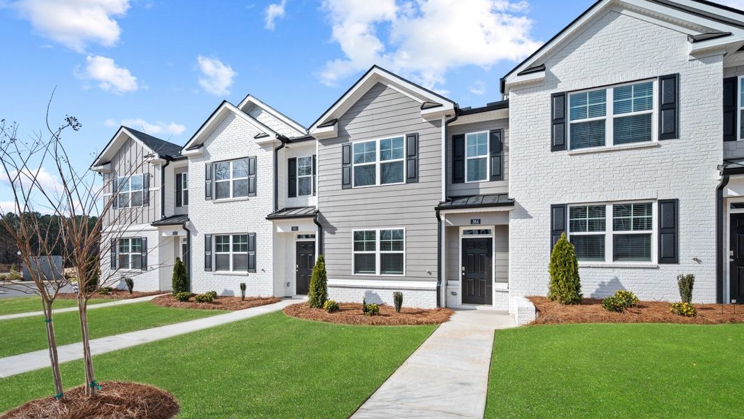 Front exterior of a new home in Echo Glen, Stockbridge, GA, highlighting curb appeal (Image 2).