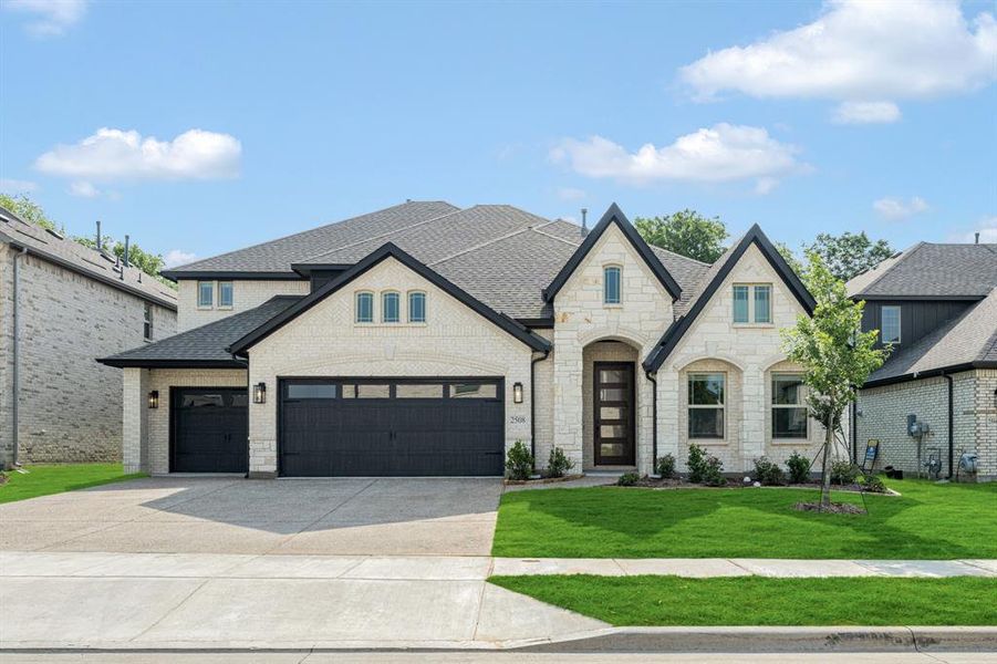 Front exterior of a new home in Legacy Ranch Classic 60, Melissa, TX, highlighting curb appeal (Image 27). Front exterior of a new home in Legacy Ranch Classic 60, Melissa, TX, highlighting curb appeal (Image 27).