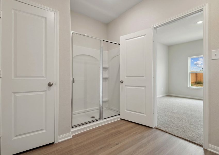 Step-in shower in the master bathroom Step-in shower in the master bathroom