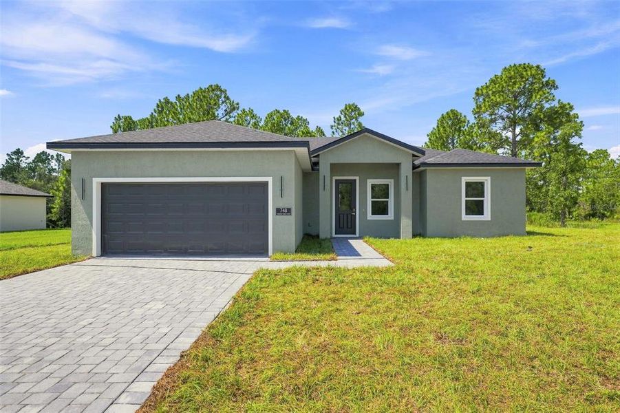 Front exterior of a new home in , Ocala, FL, highlighting curb appeal (Image 18). Front exterior of a new home in , Ocala, FL, highlighting curb appeal (Image 18).
