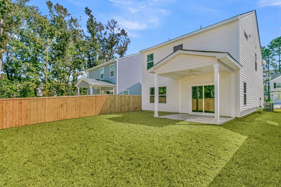 Exterior details and patio area of a home in Central Creek, Goose Creek (Image 30).