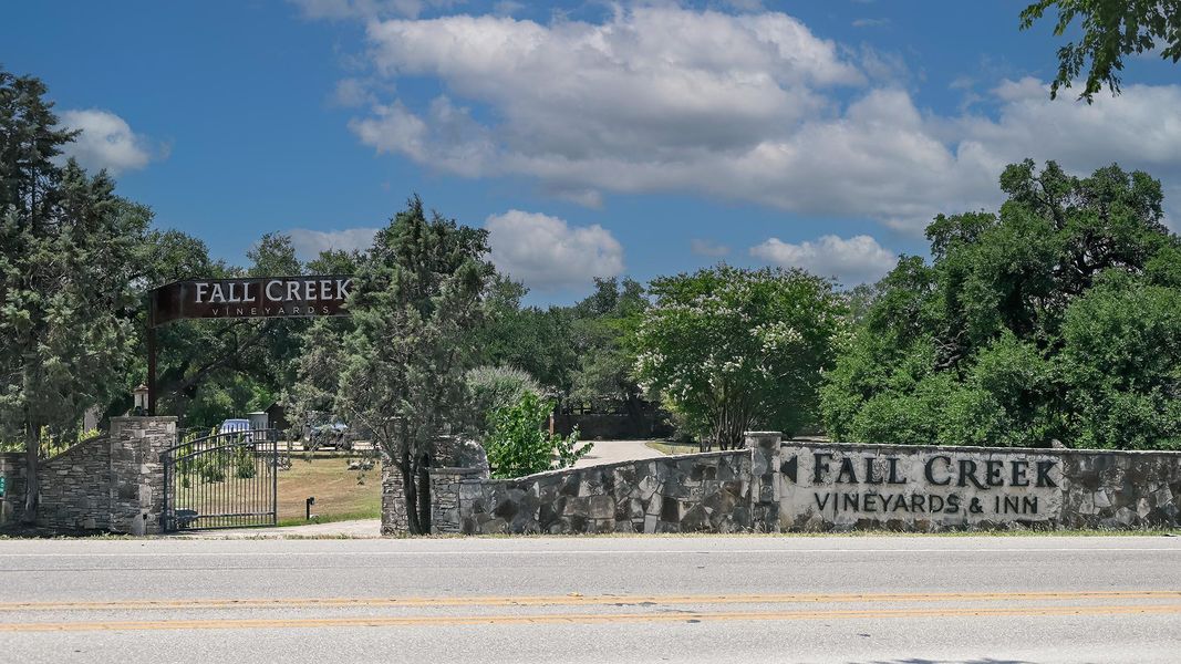 Front exterior of a new home in Parten 65', Austin, TX, highlighting curb appeal (Image 11). Front exterior of a new home in Parten 65', Austin, TX, highlighting curb appeal (Image 11).