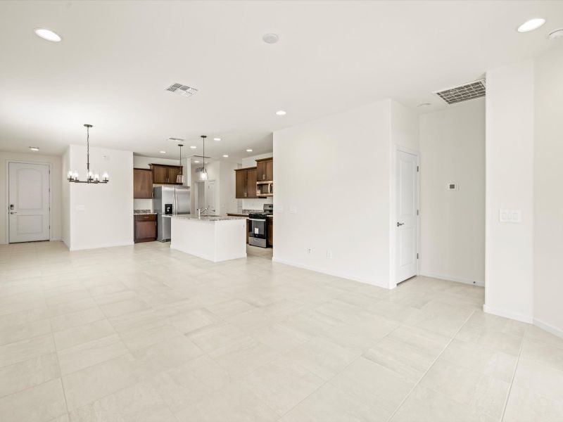 Spacious, unfurnished interior of a new home in Mandarina - Signature Series, Marana (Image 7).