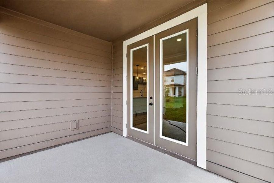 Exterior details and patio area of a home in Trailside, Mount Dora (Image 18).