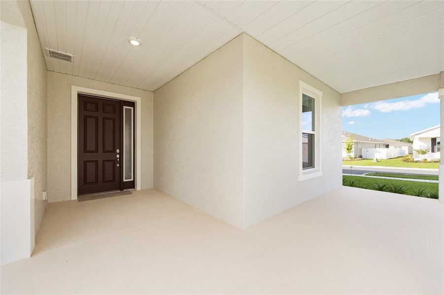 Exterior details and patio area of a home in Calesa Township, Ocala (Image 3).