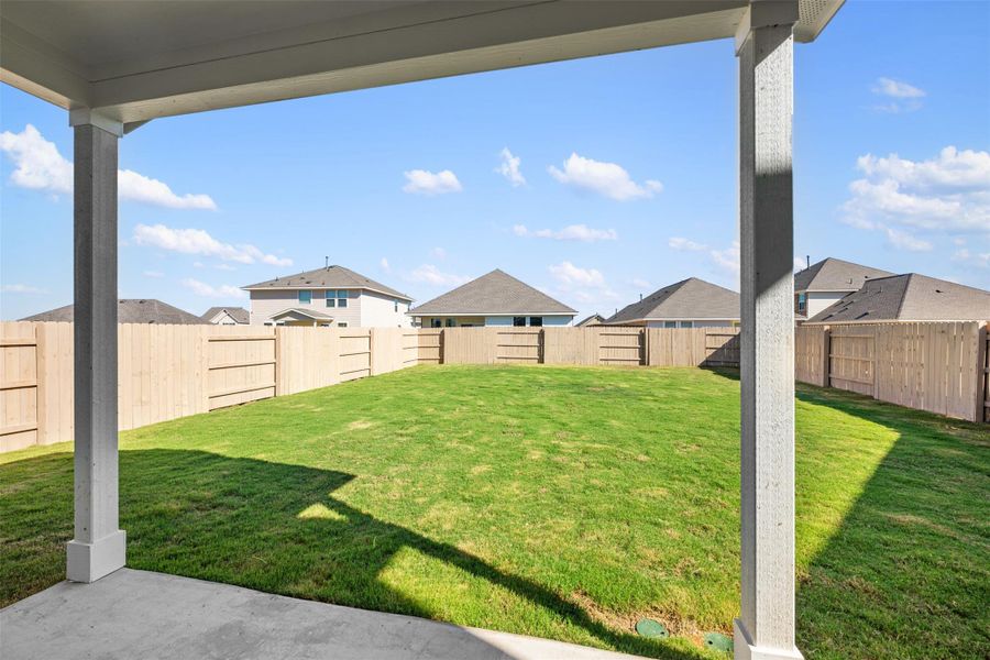 Exterior details and patio area of a home in The Colony 45s, Bastrop (Image 4).