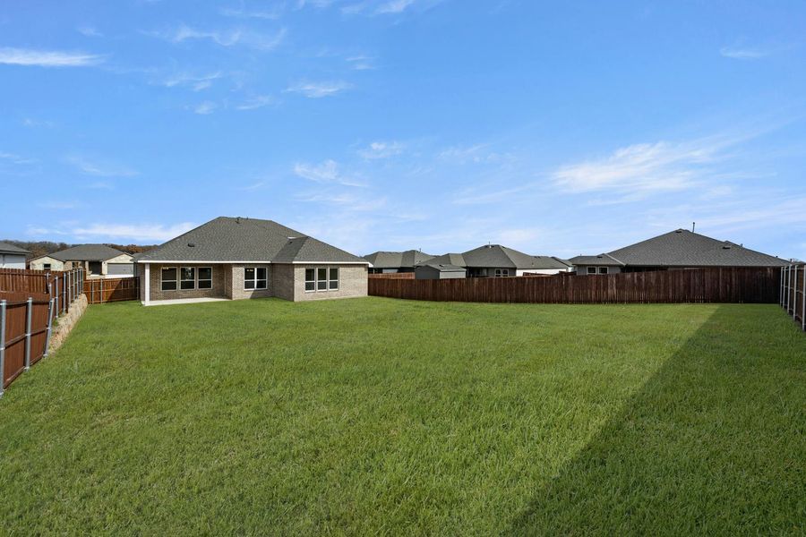 Exterior details and patio area of a home in Stone Eagle, Azle (Image 20).