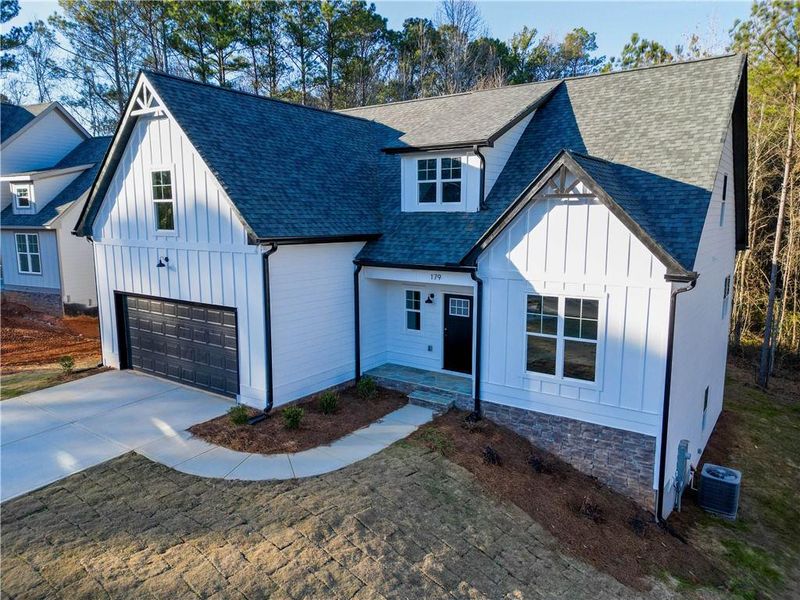 Front exterior of a new home in , Villa Rica, GA, highlighting curb appeal (Image 18).