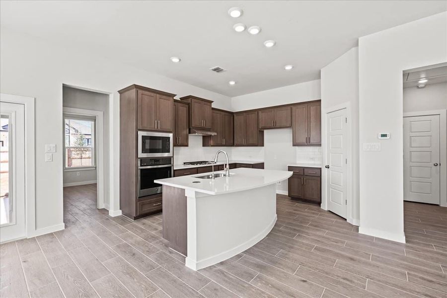 Furnished interior view inside a new home in Trace, San Marcos (Image 11).
