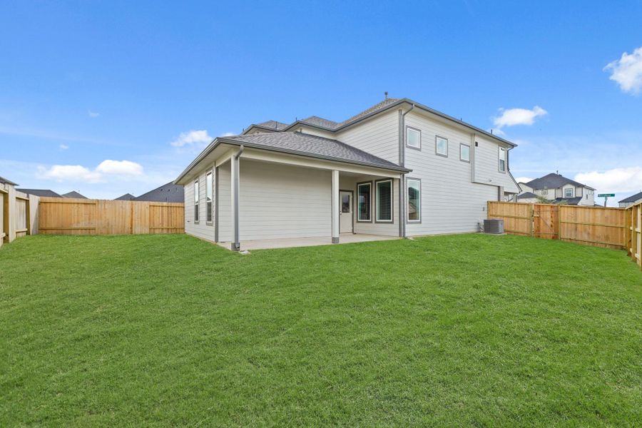 Exterior details and patio area of a home in Grand Oaks Village, Houston (Image 15). Exterior details and patio area of a home in Grand Oaks Village, Houston (Image 15).
