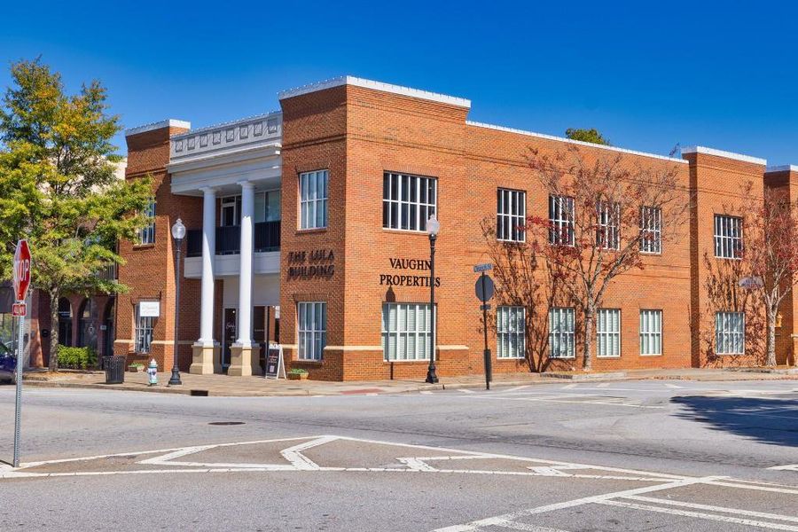 Front exterior of a new home in Pinegate, Covington, GA, highlighting curb appeal (Image 21). Front exterior of a new home in Pinegate, Covington, GA, highlighting curb appeal (Image 21).