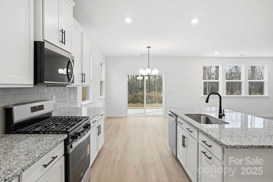 Furnished interior view inside a new home in Wellington Pointe Executive, Monroe (Image 6).