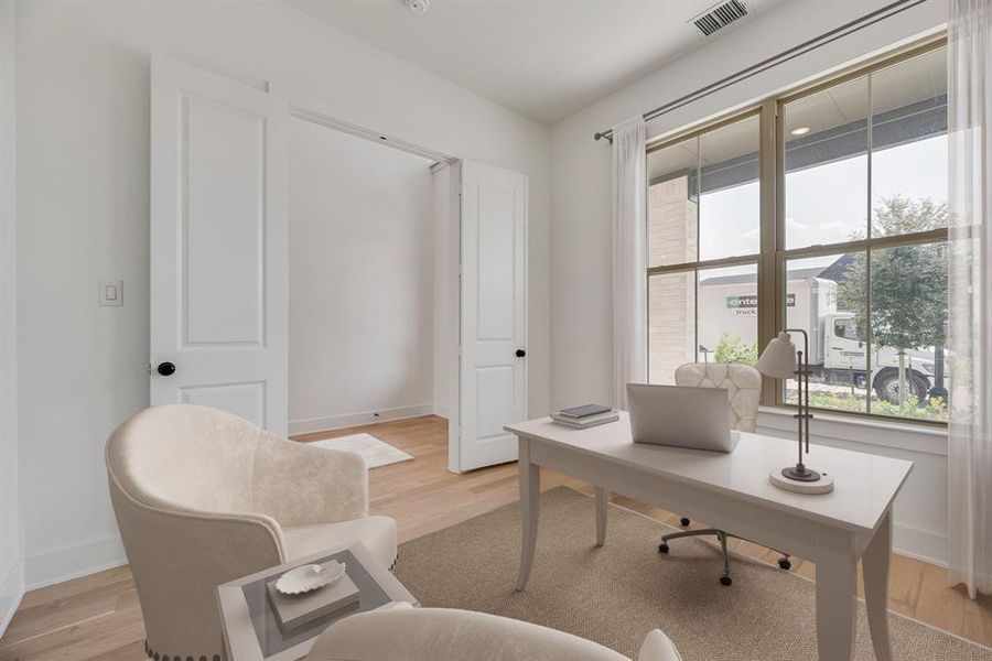 Office area featuring light wood-style flooring Office area featuring light wood-style flooring