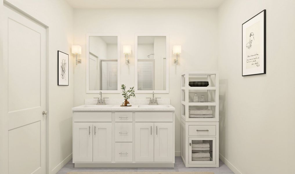 Charming mirrors and sconces in primary bath