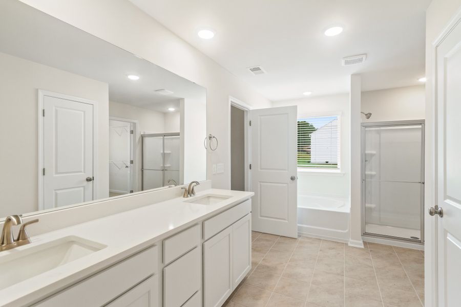 Front exterior of a new home in Heritage Bay, Sumter, SC, highlighting curb appeal (Image 15). Front exterior of a new home in Heritage Bay, Sumter, SC, highlighting curb appeal (Image 15).