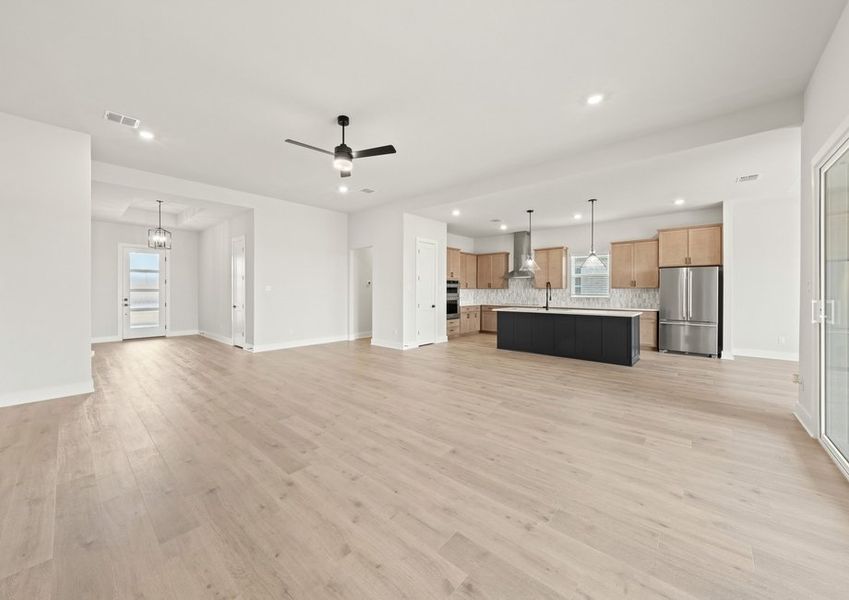 The open layout connect the kitchen with the dining room and family room.
