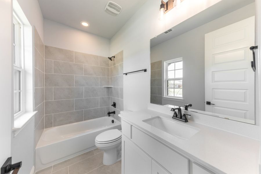 Representative furnished interior of a home built from the Cameron by UnionMain Homes in Cambridge Crossing, Celina (Image 6).