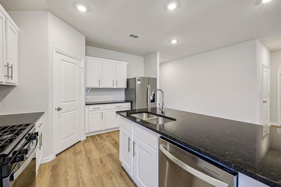 Photo is not of the actual home, but is an inspirational photo of builder’s model home and may depict options, furnishings, and/or decorator features that are not included.