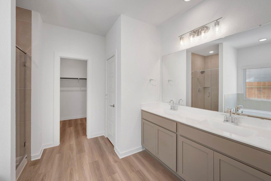 Furnished interior view inside a new home in Lone Star Landing, Montgomery (Image 9).