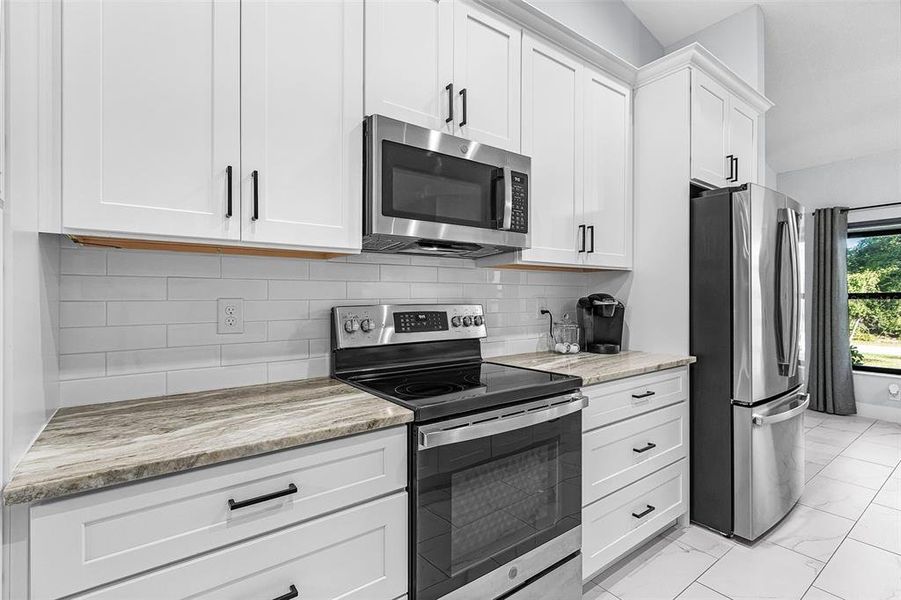 Furnished interior view inside a new home in , Port Charlotte (Image 16).