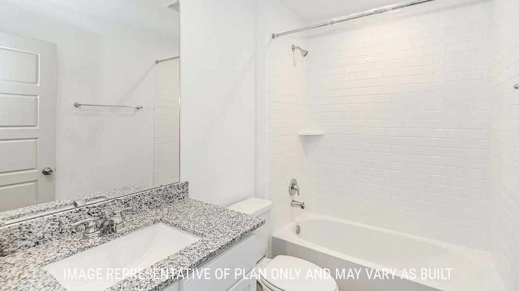 Representative furnished interior of a home built from the Lakeway by D.R. Horton in Highland Village, Nome (Image 9).