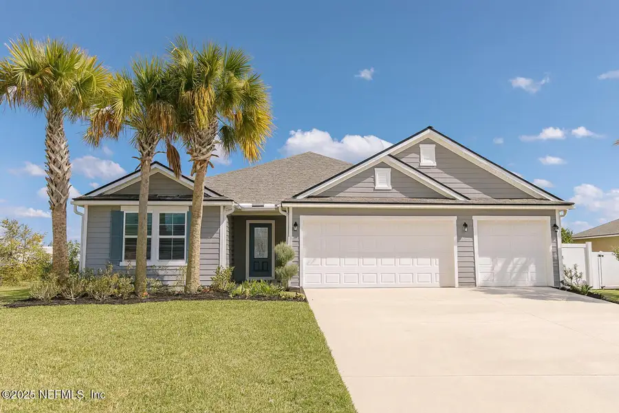 Front exterior of a new home in Cross Creek, Green Cove Springs, FL, highlighting curb appeal (Image 23).