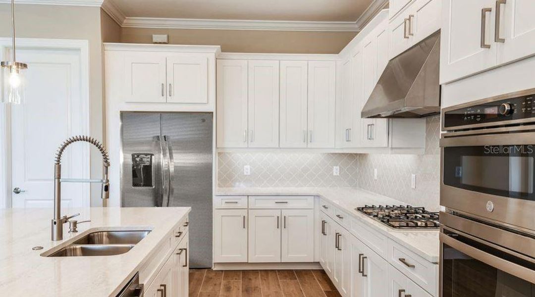 Furnished interior view inside a new home in Esplanade at Westview, Kissimmee (Image 9). Furnished interior view inside a new home in Esplanade at Westview, Kissimmee (Image 9).