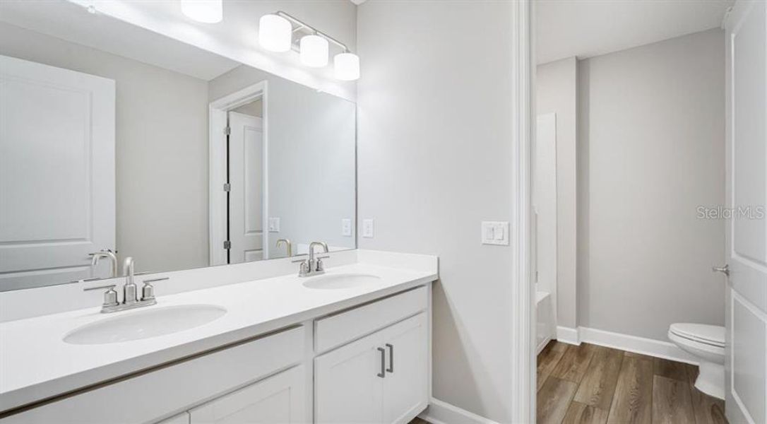 Furnished interior view inside a new home in The Cove at West Port, Port Charlotte (Image 5).