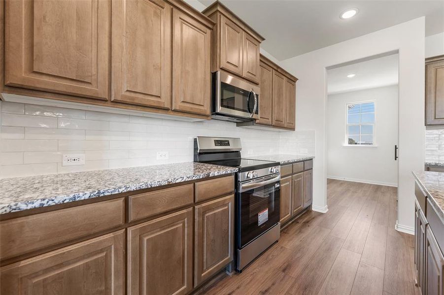 Furnished interior view inside a new home in Clear Sky Addition, Valley View (Image 16).