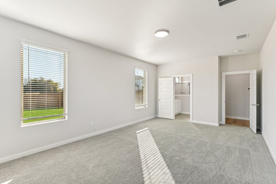 Primary Suite in the Wimbledon home plan by Trophy Signature Homes – REPRESENTATIVE PHOTO Primary Suite in the Wimbledon home plan by Trophy Signature Homes – REPRESENTATIVE PHOTO