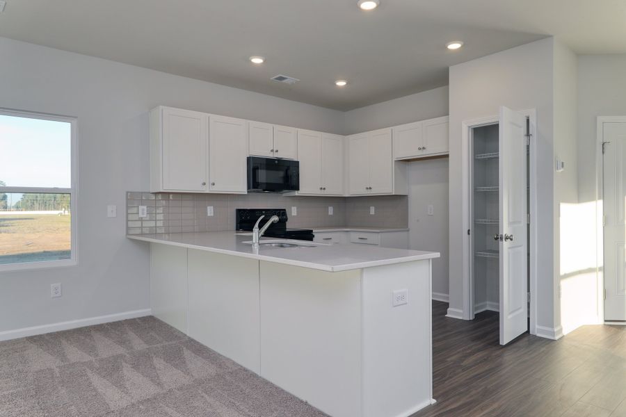 Furnished interior view inside a new home in Hainer Place, Conway (Image 10).