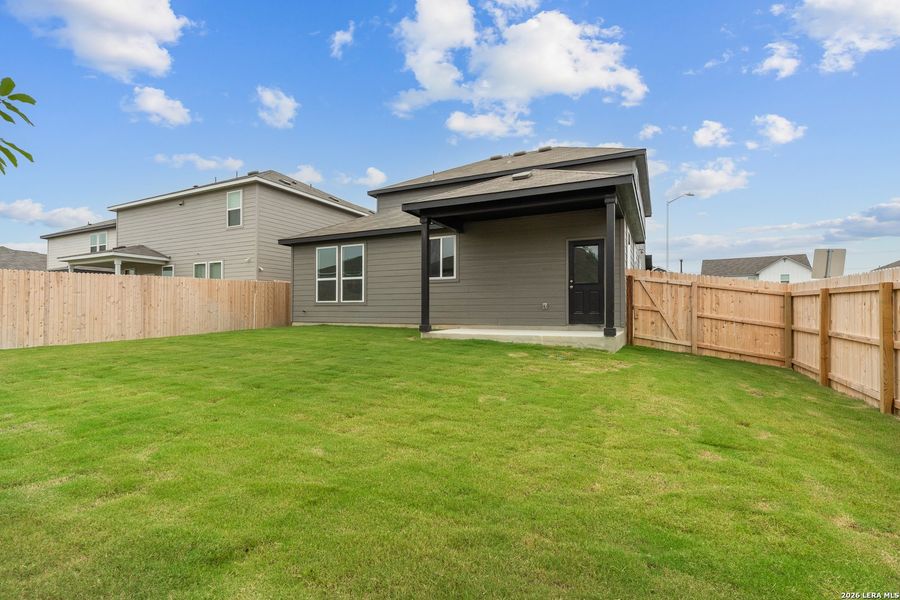 Exterior details and patio area of a home in Vista Real, Converse (Image 3).