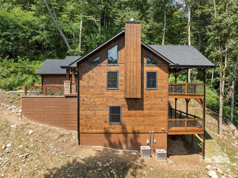 Front exterior of a new home in , Maggie Valley, NC, highlighting curb appeal (Image 24).