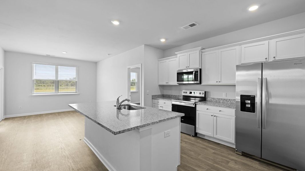 Representative furnished interior of a home built from the ARIA by D.R. Horton in The Ranch, Holly Hill (Image 8).