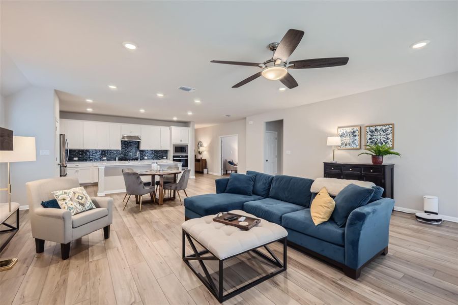 The large living area has enough room for even your largest couch, plus a few chairs and tables to boot!  Everyone will have a place to relax and enjoy the open homey space.