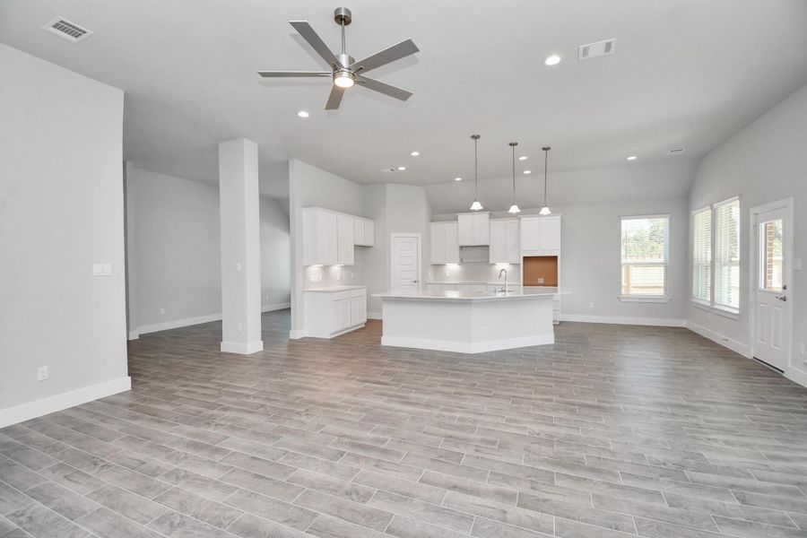 This kitchen is by far any chef’s dream! This spacious kitchen features high ceilings, stained wood cabinets, granite countertop, SS appliances, modern tile backsplash, recessed lighting, extended counter space, granite kitchen island with double sink, and space for breakfast bar, and a walk-in pantry all overlooking your huge family room. Sample photo of completed home with similar floor plan. Actual colors and selections may vary. This kitchen is by far any chef’s dream! This spacious kitchen features high ceilings, stained wood cabinets, granite countertop, SS appliances, modern tile backsplash, recessed lighting, extended counter space, granite kitchen island with double sink, and space for breakfast bar, and a walk-in pantry all overlooking your huge family room. Sample photo of completed home with similar floor plan. Actual colors and selections may vary.