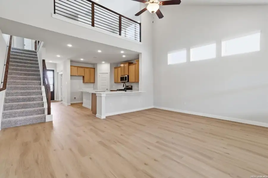 Spacious, unfurnished interior of a new home in Hunters Ranch, San Antonio (Image 18).