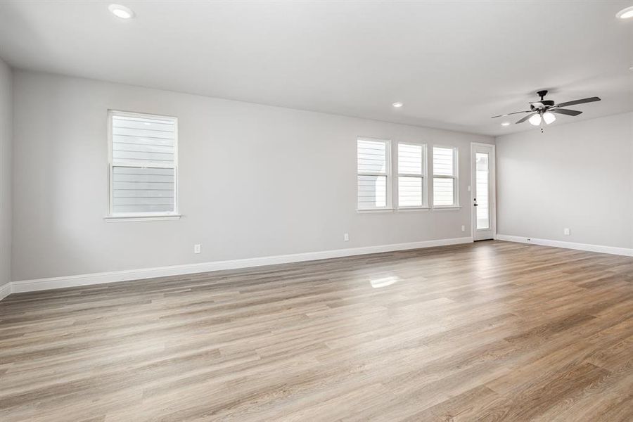 Unfurnished room featuring recessed lighting, light wood finished floors, and a ceiling fan