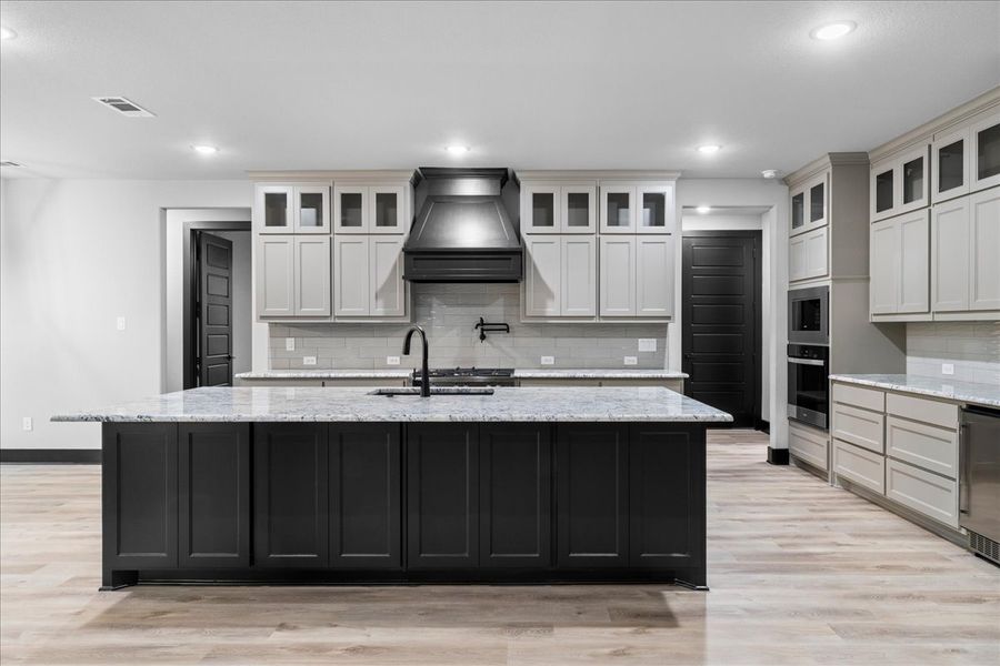 Representative furnished interior of a home built from the The Harper II by Doug Parr Custom Homes in Monarch Manor, Poolville (Image 6).