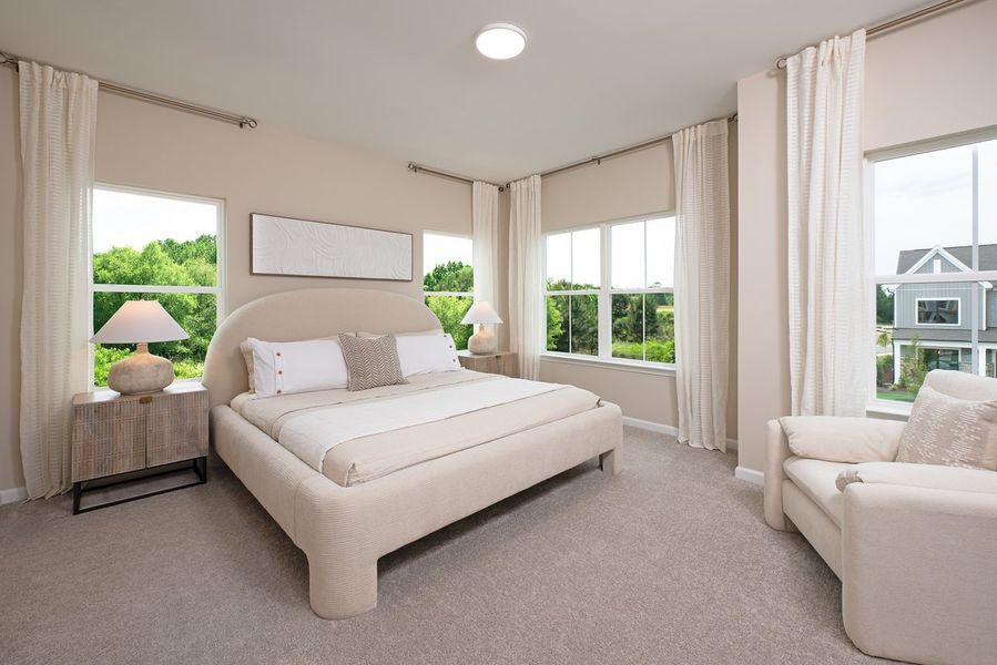 Furnished interior in a model home at Preserve at The Point in Rolesville (Image 18).