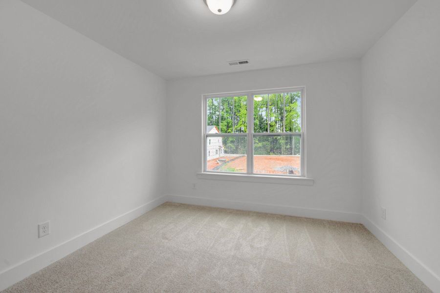Spacious, unfurnished interior of a new home in Ashmore Townes, Garner (Image 21). Spacious, unfurnished interior of a new home in Ashmore Townes, Garner (Image 21).