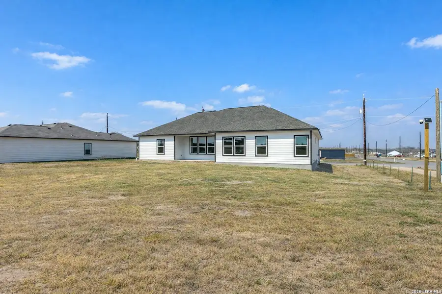 Exterior details and patio area of a home in , Atascosa (Image 3).