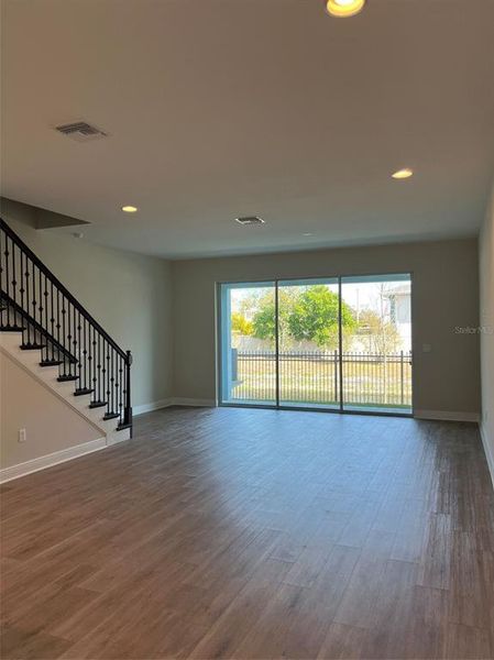 Spacious, unfurnished interior of a new home in The Towns At Long Bayou, Seminole (Image 11).