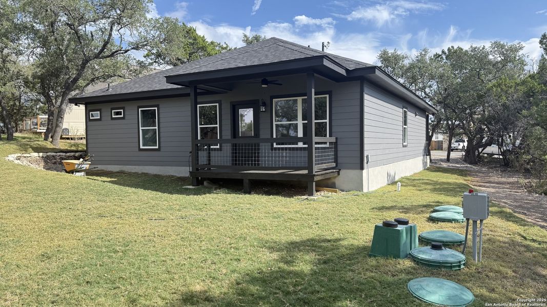 Exterior details and patio area of a home in , Spring Branch (Image 3). Exterior details and patio area of a home in , Spring Branch (Image 3).
