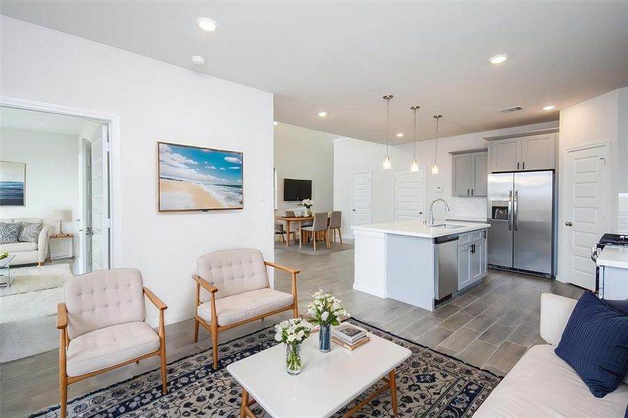 Envision the ease of living in this open-concept space, where the living area flows effortlessly into the dining and kitchen. Envision the ease of living in this open-concept space, where the living area flows effortlessly into the dining and kitchen.