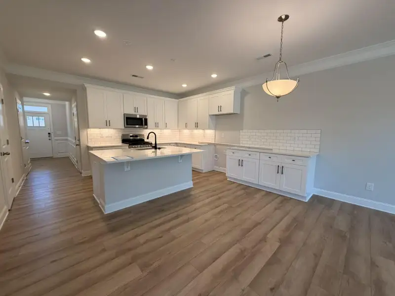 Spacious, unfurnished interior of a new home in Harrisburg Village Townhomes, Harrisburg (Image 14).