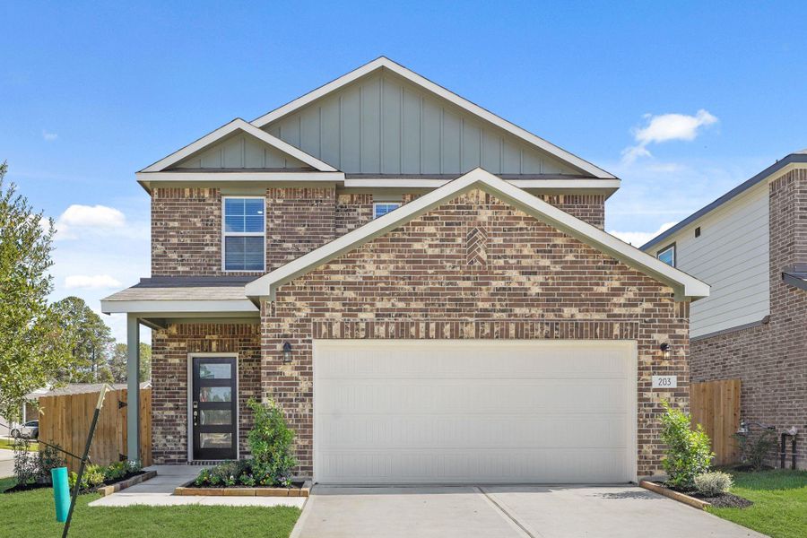 Front exterior of a new home in Lakes at Black Oak, Magnolia, TX, highlighting curb appeal (Image 2).